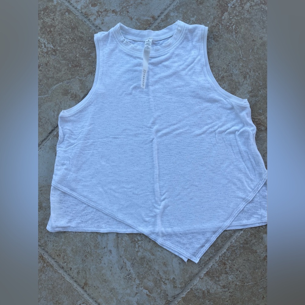 Lululemon size 8 white tank top.  Never worn.